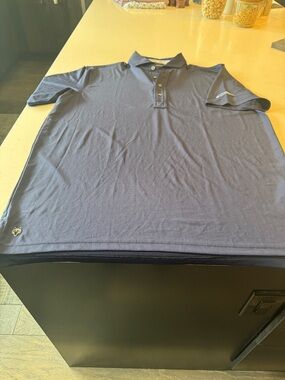 Greyson Men's Navy Polo Shirt with Subtle Logos whitefish mt iron horse